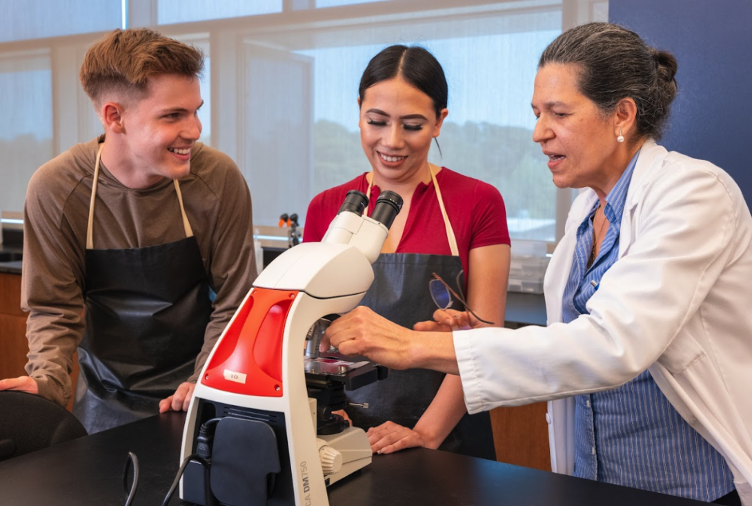 San Jacinto students working hands-on with a professor